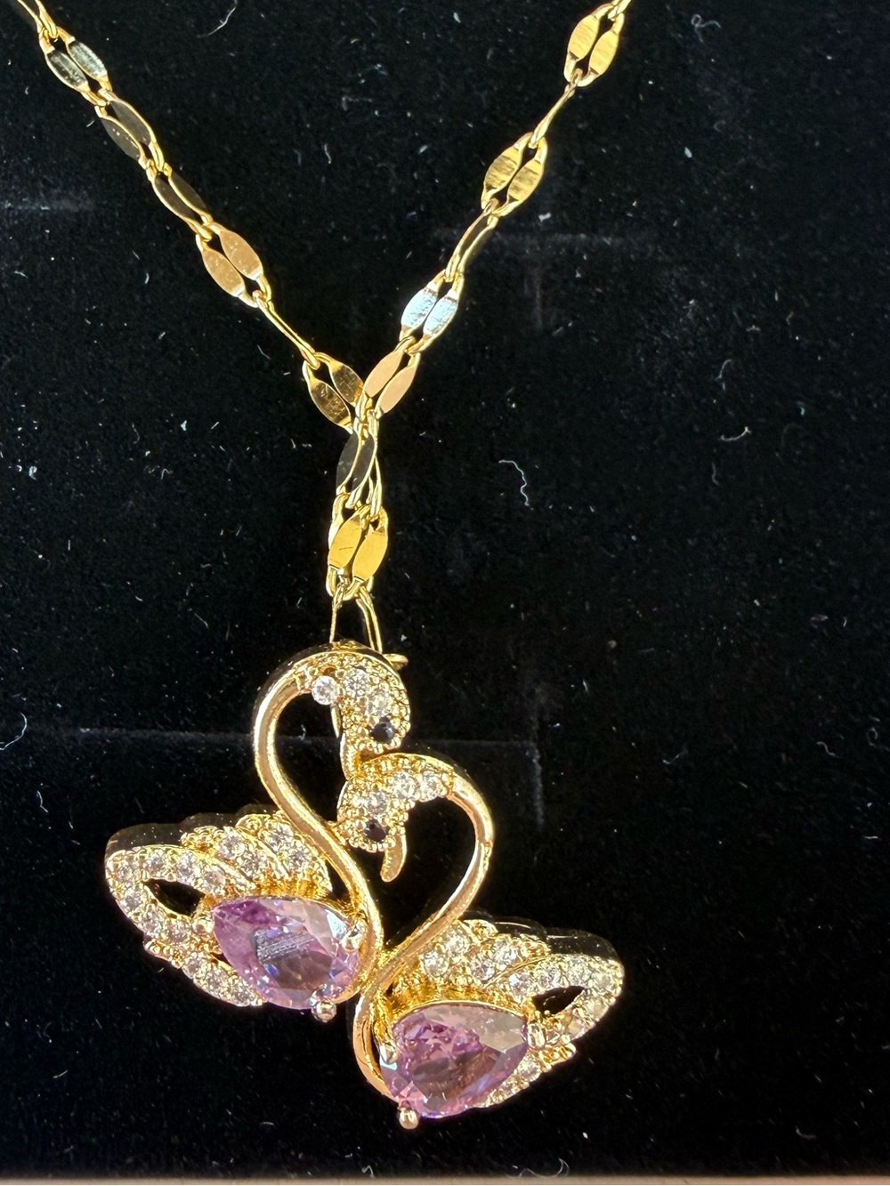 Gold-Tone Swan Necklace with Purple Crystal Accents